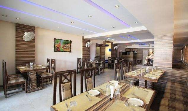 Hotel Eden Ahmedabad Restaurante foto